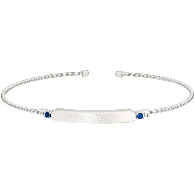 ladies hammered gold bracelets -Rhodium Finish Sterling Silver Cable Cuff Bracelet with Name Plate and Simulated Blue Sapphire Birth Gems - September