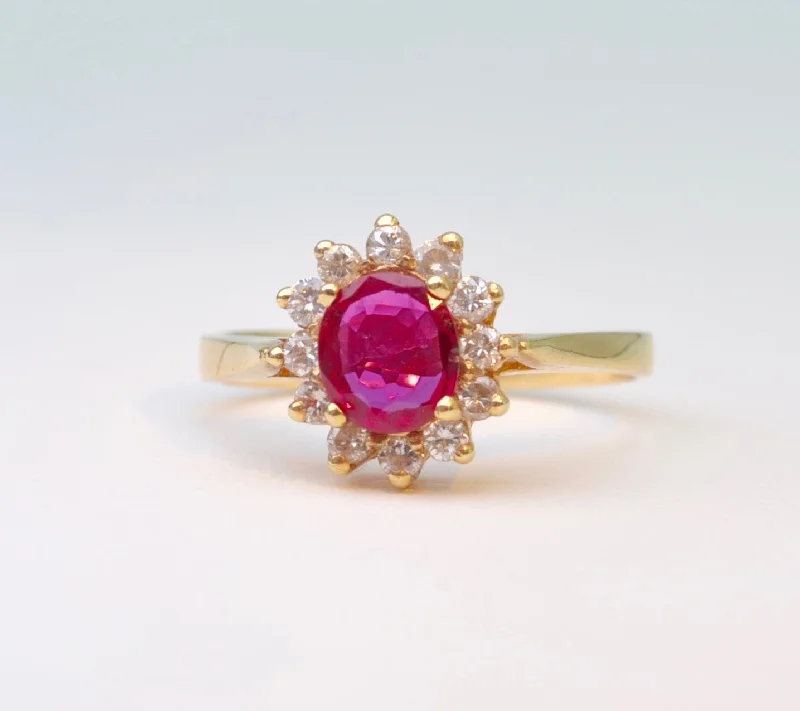 Ladies dazzling party rings -14K yellow gold ring with one center Ruby and 12 surrounding Diamonds