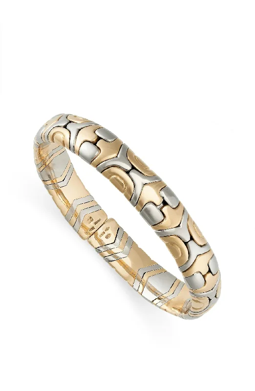 ladies gold bracelets wave patterns -Bulgari Alveare Gold and Steel Cuff Bangle