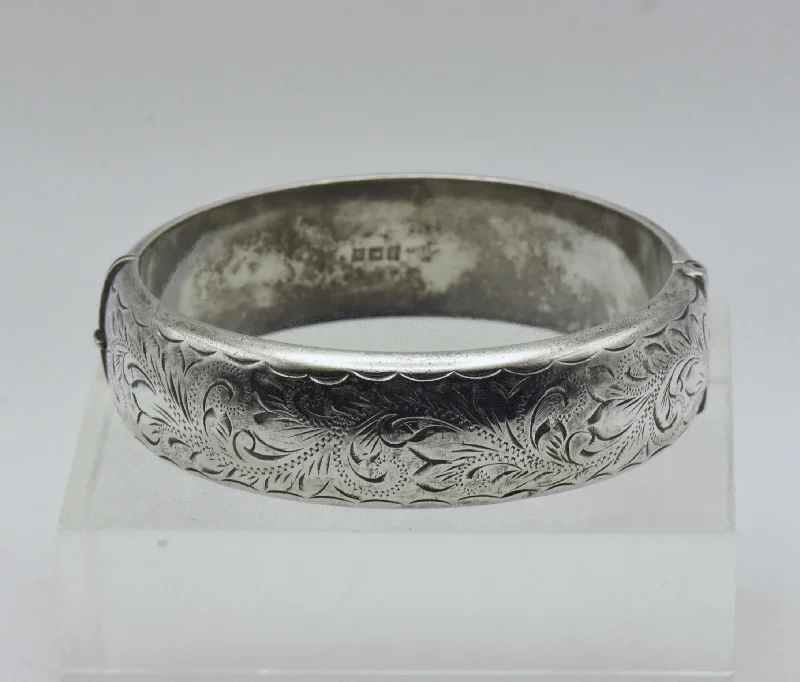 ladies leather bracelets with accents -Harrod's - Vintage 1960s English Sterling Silver Wide Hinged Bangle