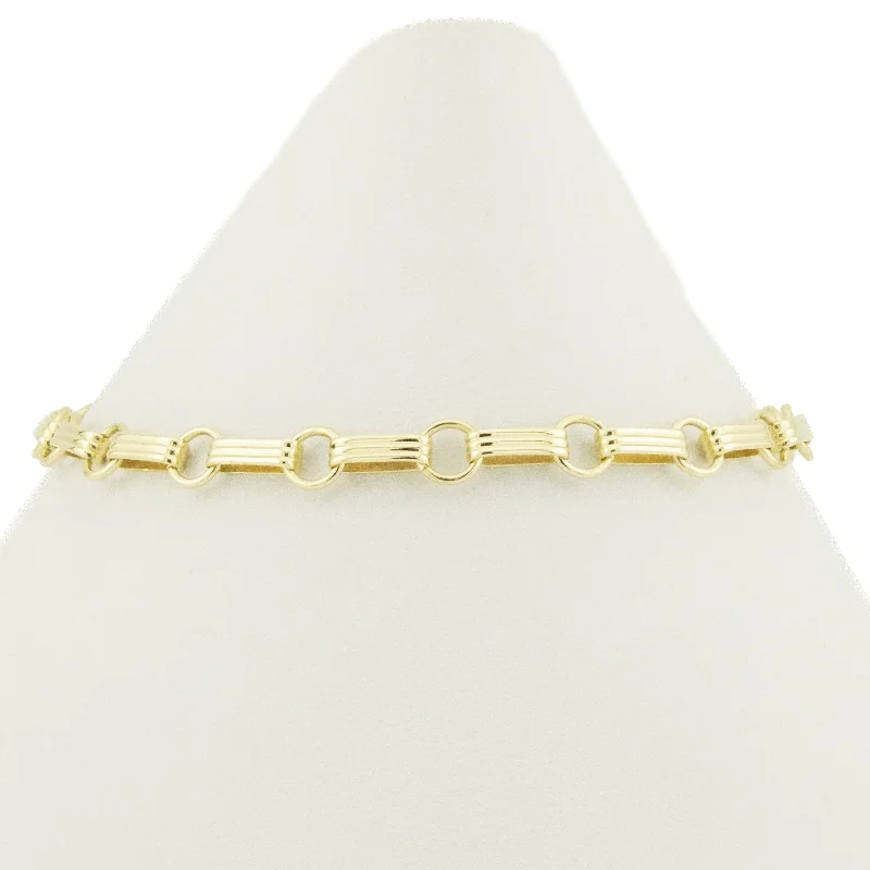 ladies party bracelets gold finish -5mm Wide Gold Fancy Link 7" Bracelet in 14K Yellow Gold - 4.3grams