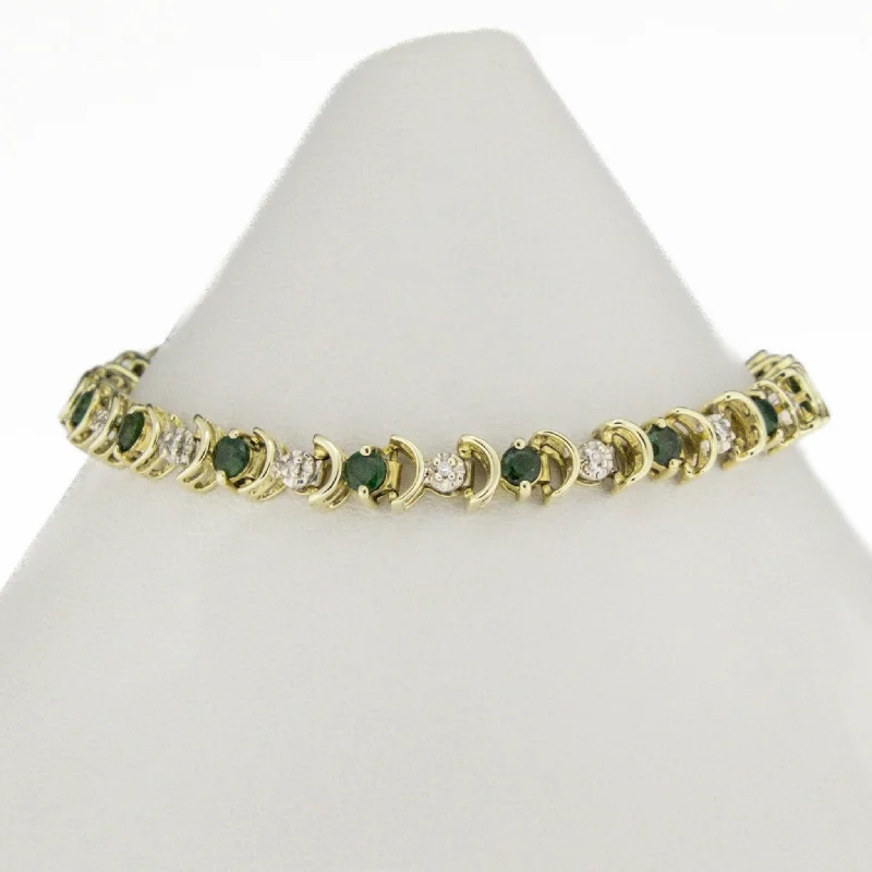 ladies white gold bracelets pearls -2.80ctw Emerald & Diamond Accented Tennis 7" Bracelet in 10K Two-Tone Gold