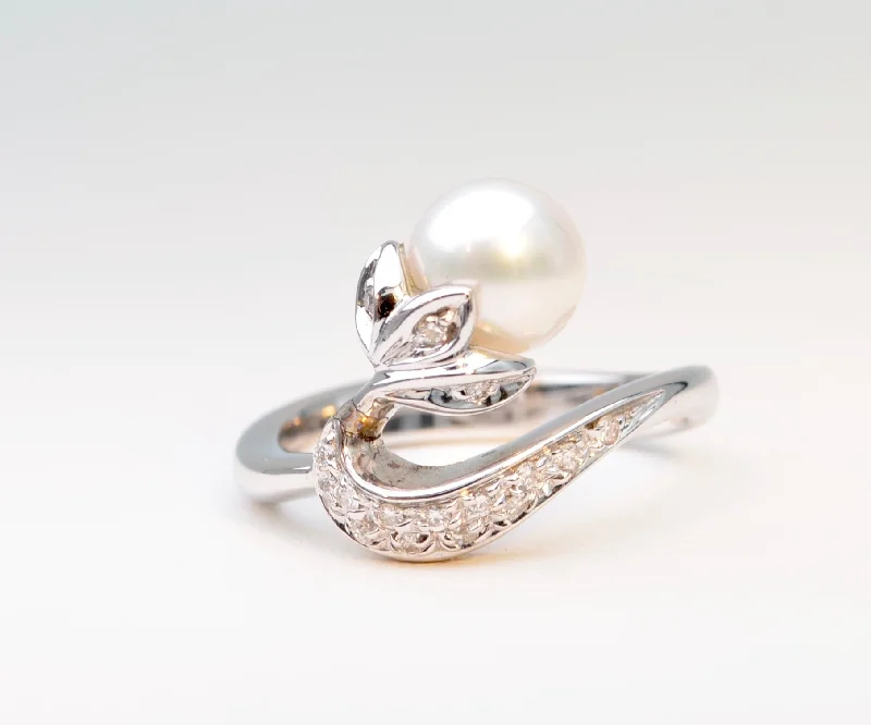 Ladies sleek onyx rings -Pearl and Diamond Swan Ring