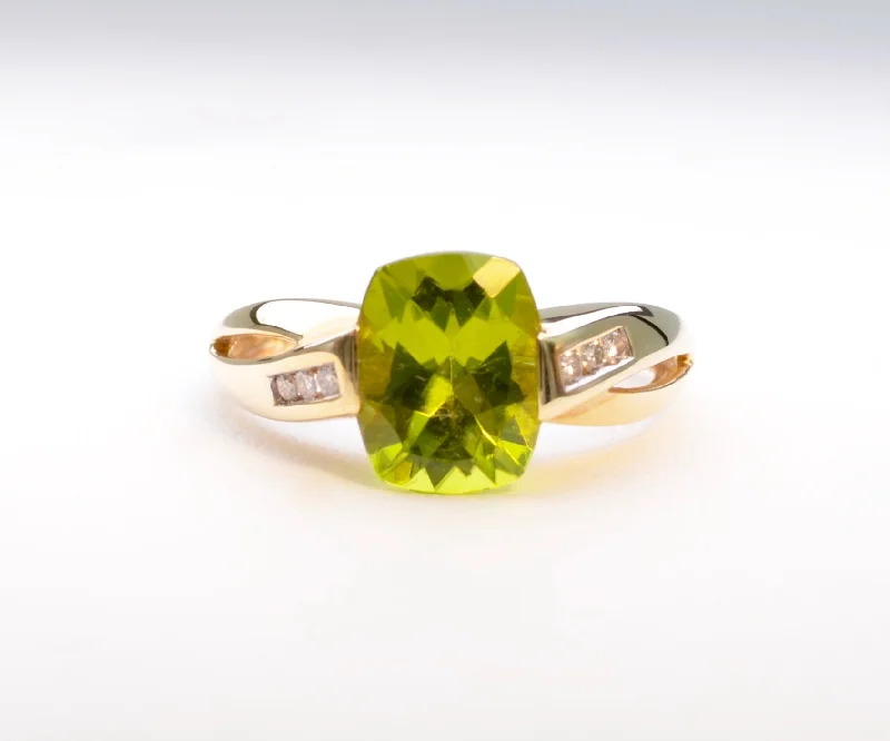 Ladies gleaming platinum rings -Faceted Peridot and Diamond Ring