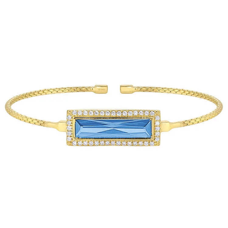 ladies charm bracelets animal designs -Gold Finish Sterling Silver Cable Cuff Bracelet with Rectangular Simulated Blue Topaz Stone and Simulated Diamonds