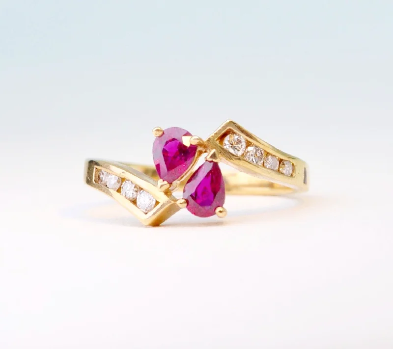 Ladies seaside shell rings -14K yellow gold ring with 2 pear-shaped Rubies and 8 side Diamonds